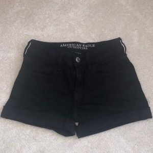 American Eagle, black shorts.